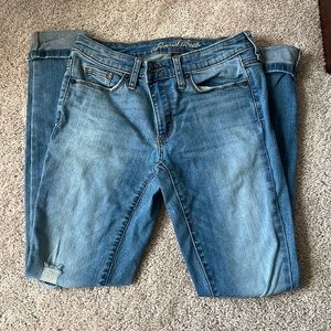 Universal Threads women’s mid-rise skinny jeans, size 2/26R